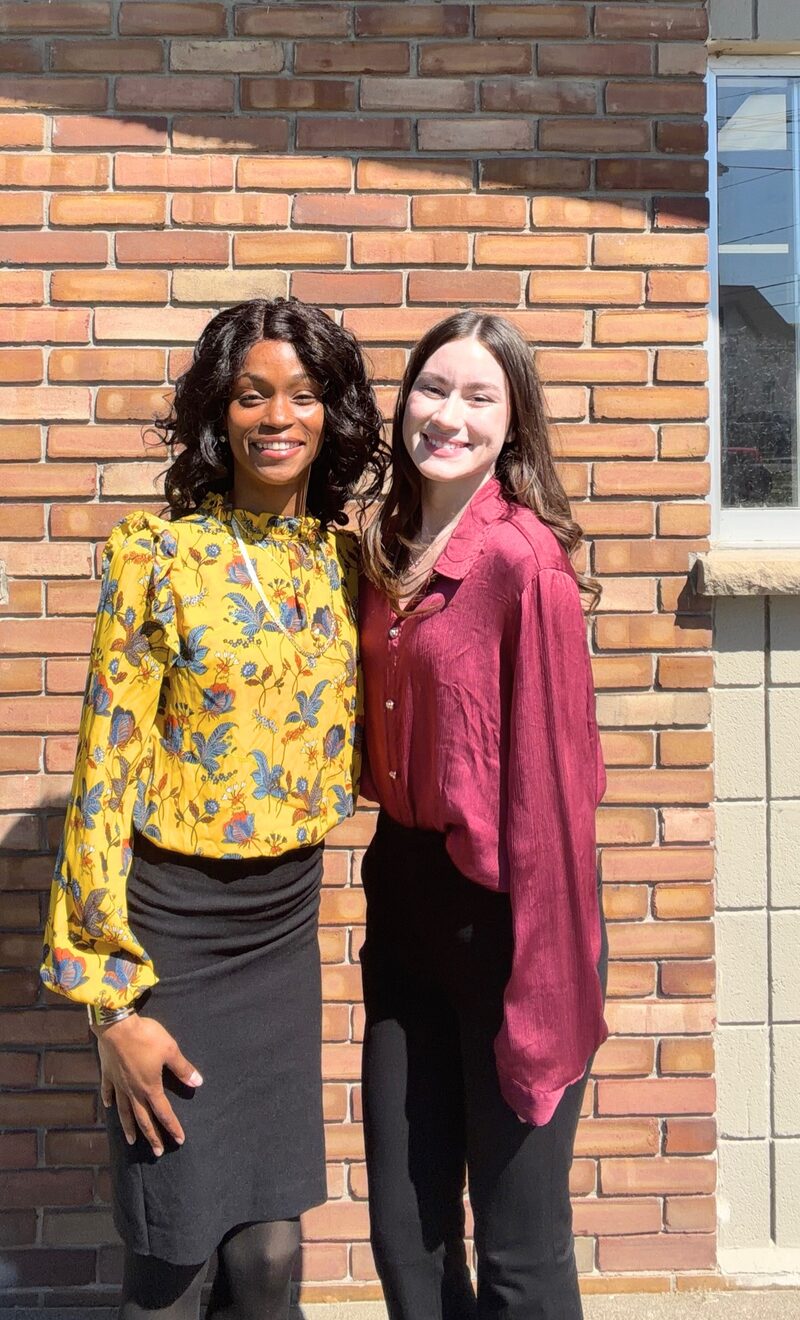 Raedemption Marketing mentor and associate together outside the office